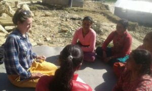 International Volunteers with local people discussing about environmental Issues