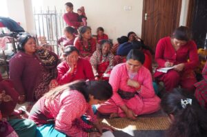 Women discussing about pollution in their Community