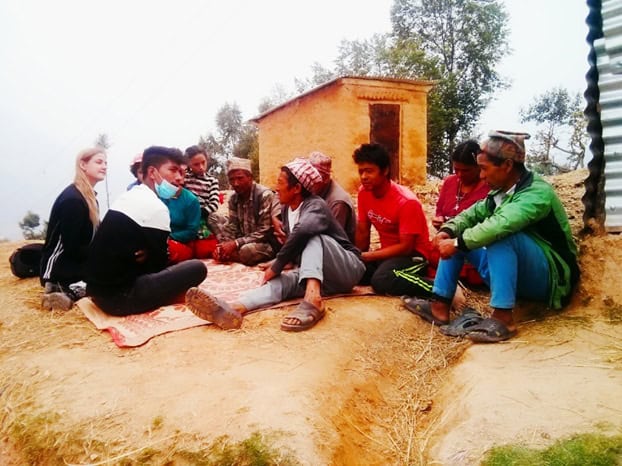 Volunteer taking the data from local people