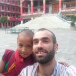 jeremie Gicquel enjoying with children at buddhist monastery