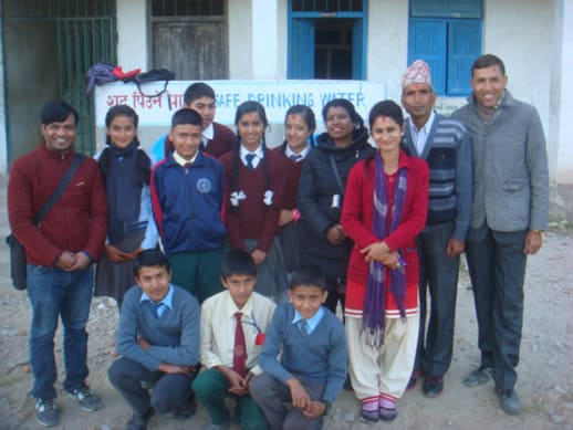 All children and facilitators taking picture after child club meeting