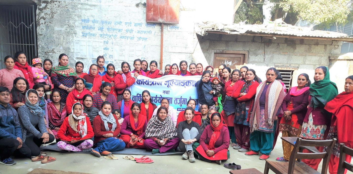 women participating in evaluation and plan formulation session