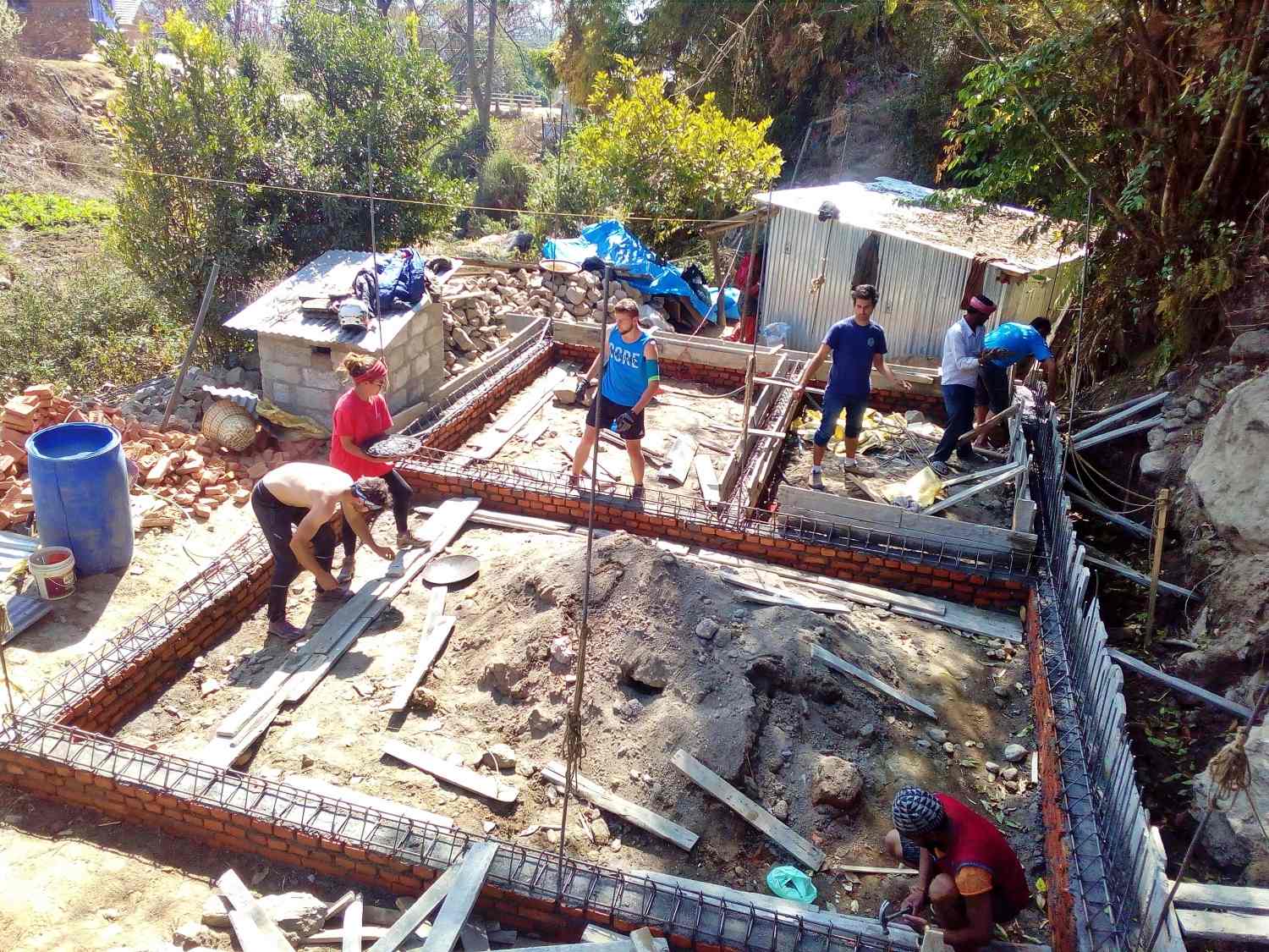 Volunteers helping rebuild homes after earthquake in Nepal