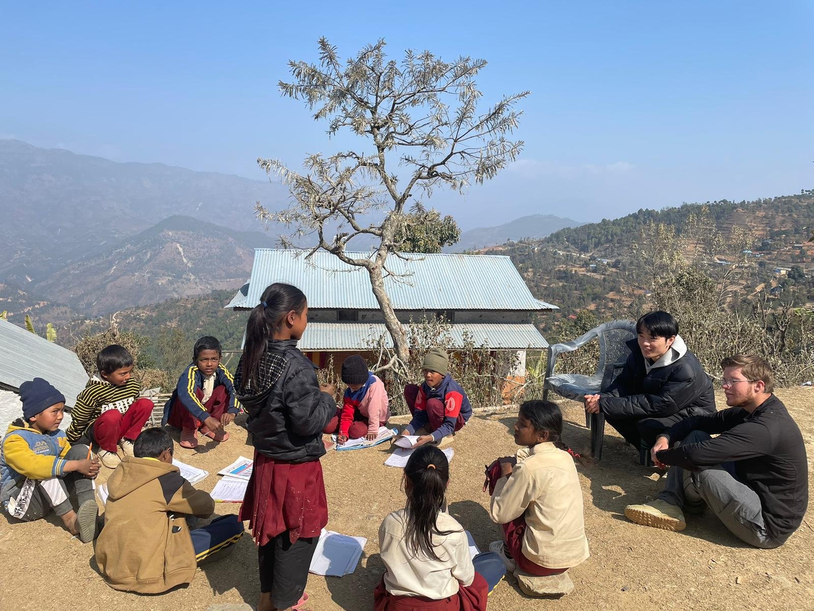 Intern filming a documentary in Nepal