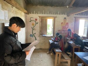 Volunteer writing a grant proposal for a rural education NGO in Nepal.