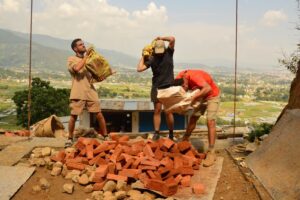 Disaster relief team providing support after landslide in Nepal
