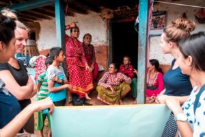 Volunteer midwife assisting childbirth in rural Nepal