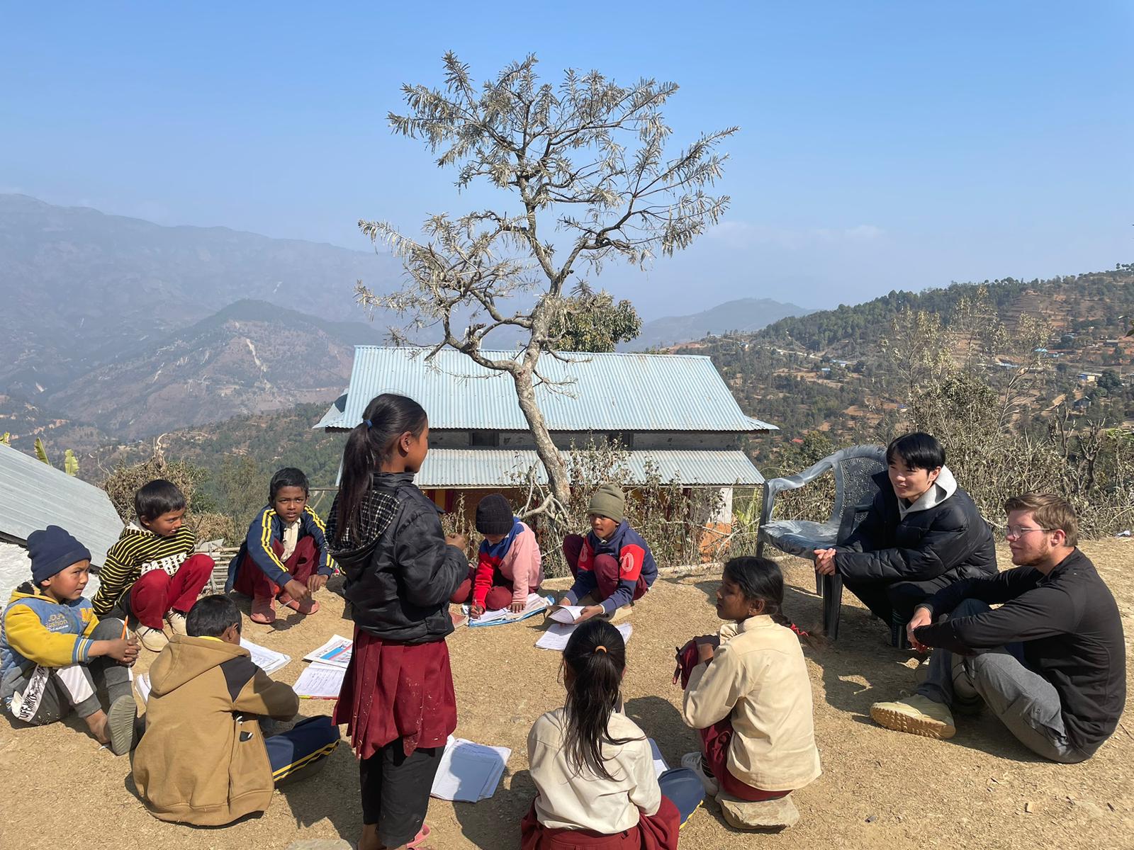 Volunteer teaching drama to students in Nepal