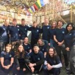 Volunteer work in Nepal teaching English to kids in a classroom.