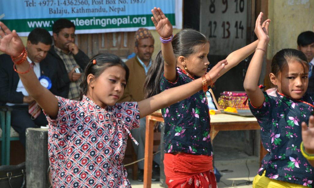 Cultural dance by girls in school program